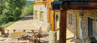 Beautiful Riverfront Log Cabin with Mountain Views, Firepit, and Gas Grill