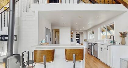 Amazing dog-friendly mountain view home with hot tub, wood stove, patio, & deck