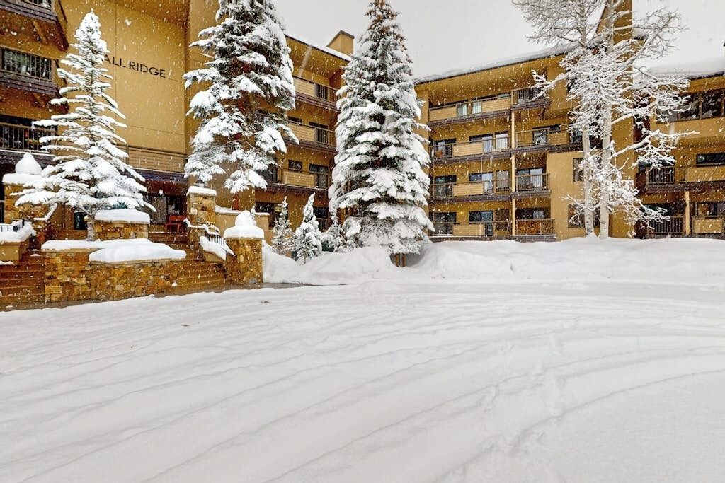 A snow-covered courtyard with a building labeled 'ALLRIDGE' in the background.