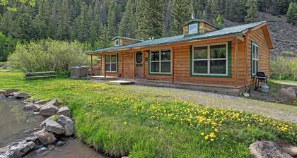 Creekside cabin with private hot tub, washer/dryer, WiFi & wood fireplace