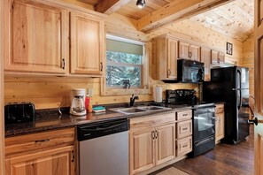 Fridge, microwave, oven, stovetop - Waterfront cabin with bridge, private hot tub, & WiFi - near National Forest (South Fork)