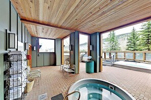 A wooden ceiling, a hot tub, and a view of trees and mountains. - Keystone Condo w/Mountain Views, Shared Pool/Hot Tub - Near Ski Lift/Restaurants (Keystone)