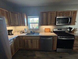 Private kitchen - Modern Country Cottage is a 2-bedroom bungalow in peaceful Loon Lake WA. (Loon Lake)