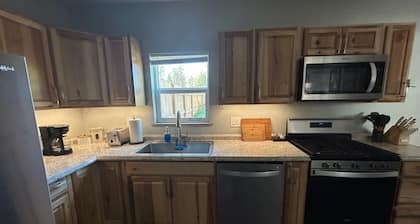 Modern Country Cottage is a 2-bedroom bungalow in peaceful Loon Lake WA.