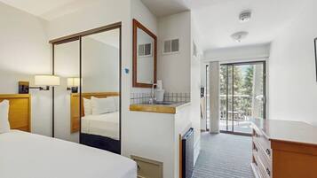 Iron/ironing board, travel crib, free WiFi, bed sheets