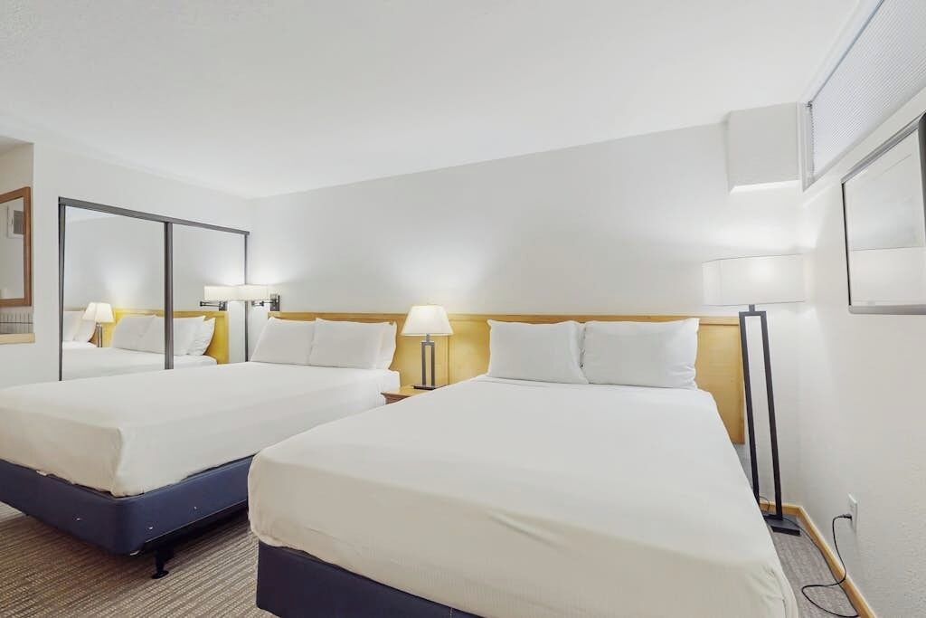 Iron/ironing board, travel crib, free WiFi, bed sheets