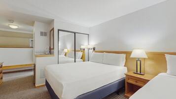 Iron/ironing board, travel crib, free WiFi, bed sheets