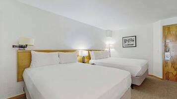 Iron/ironing board, travel crib, free WiFi, bed sheets