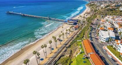 Dog-friendly condo with an ocean view, balcony & pool - beach across the street