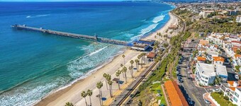 Dog-friendly condo with an ocean view, balcony & pool - beach across the street