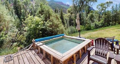 Rustic cabin with shared hot springs on the Crystal River