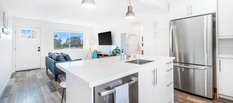 Convenient dog-friendly condo with free WiFi - right up from the beach