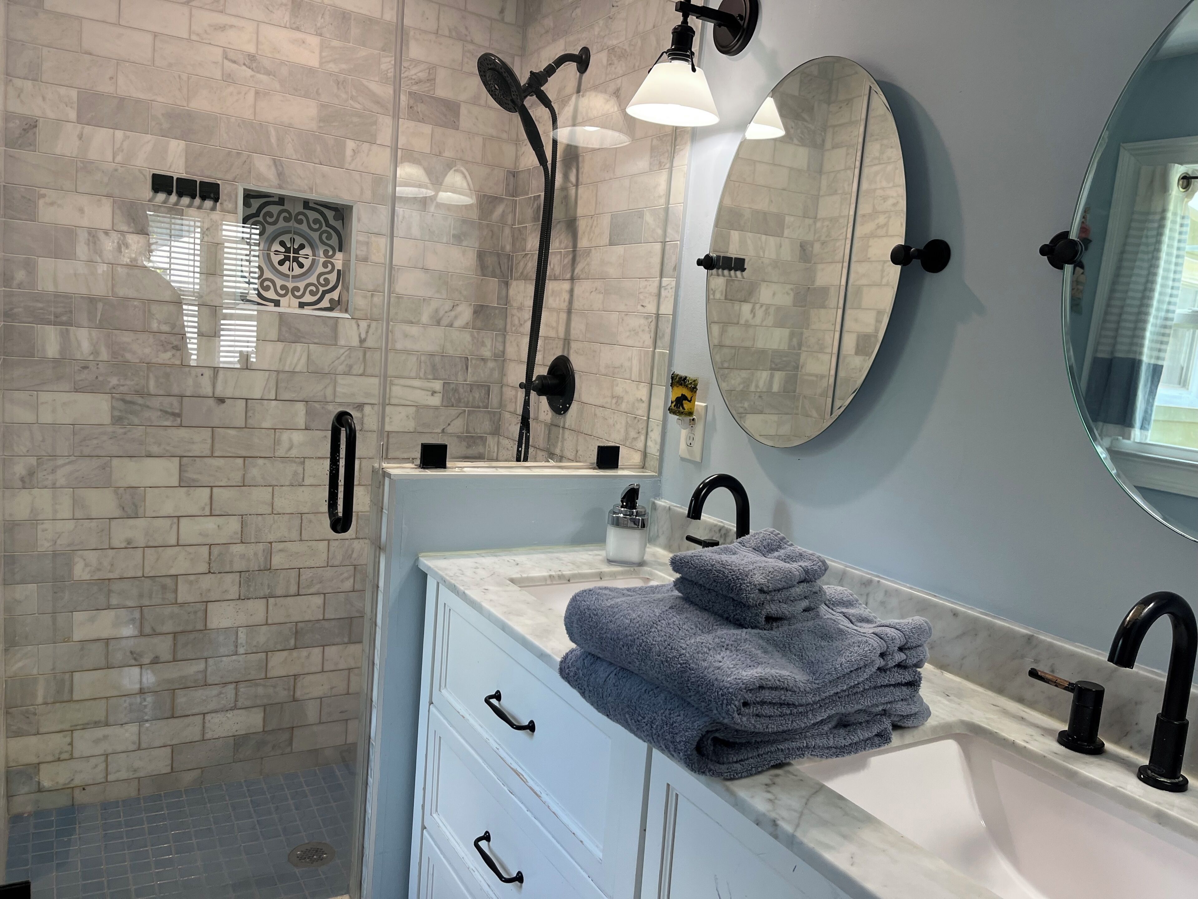 Shower, hair dryer, towels, soap