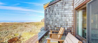 Stunning ocean-view home with W/D, sauna, tennis court, & patio - beach access
