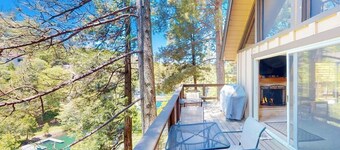 Serene lakefront getaway with game room, fireplace, & washer/dryer