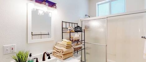 Shower, hair dryer, towels