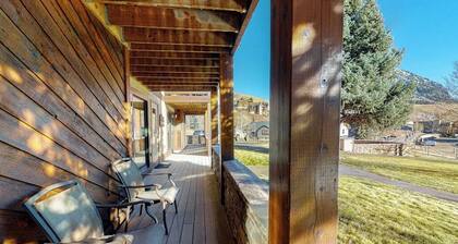 Mountain-view condo with private deck, fireplace & hot tub