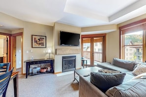 TV, fireplace - Ski-In/Ski-Out Modern Condo with Shared Hot Tub & Sauna - Views of the Village (Copper Mountain)
