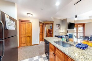 Fridge, microwave, oven, stovetop - Ski-In/Ski-Out Modern Condo with Shared Hot Tub & Sauna - Views of the Village (Copper Mountain)