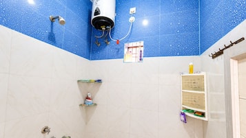 Shower, towels, soap, toilet paper