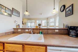 Fridge, microwave, oven, stovetop - Ground-level condo w/ private balcony & shared hot tub - on bus route (Frisco)