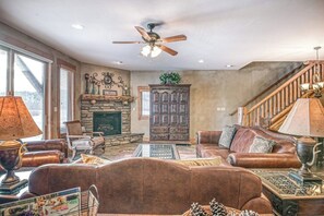 TV, fireplace, books