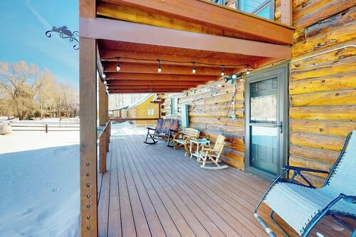 Riverfront home with river & valley views, wood stove, deck, & W/D