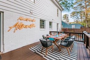Outdoor dining - Soulfull ATL | Hot Tub  • Fire Pit  • 4BR Retreat Near Midtown (Decatur)