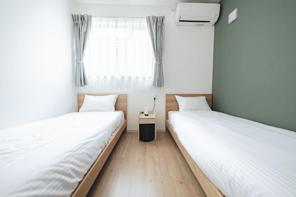 Habitación básica con 2 camas individuales | Wifi gratis