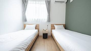 Habitación básica con 2 camas individuales | Wifi gratis