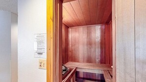 A sauna room with wooden walls and a bench. - TL1112 | Mountain Condo | Pool | Hot Tubs | Winter Shuttles (Steamboat Springs)