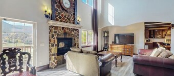 Luxe home on Gypsum Creek Golf Course with fireplace and mountain views