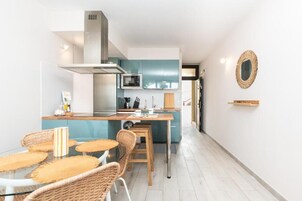 Apartamento luxo, vista para o jardim | Cozinha privada