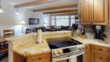 Coffee/tea maker, fridge, microwave, oven