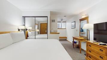 Iron/ironing board, travel crib, free WiFi, bed sheets