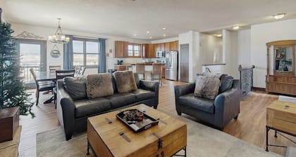 Mountain getaway with hot tub, game room, fireplace, and modern interior