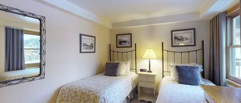 Iron/ironing board, travel crib, free WiFi, bed sheets