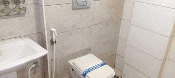 Ducha, toallas, jabón, shampoo