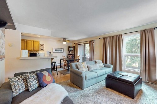 Riverfront condo with mountain views - close to conveniences & the slopes