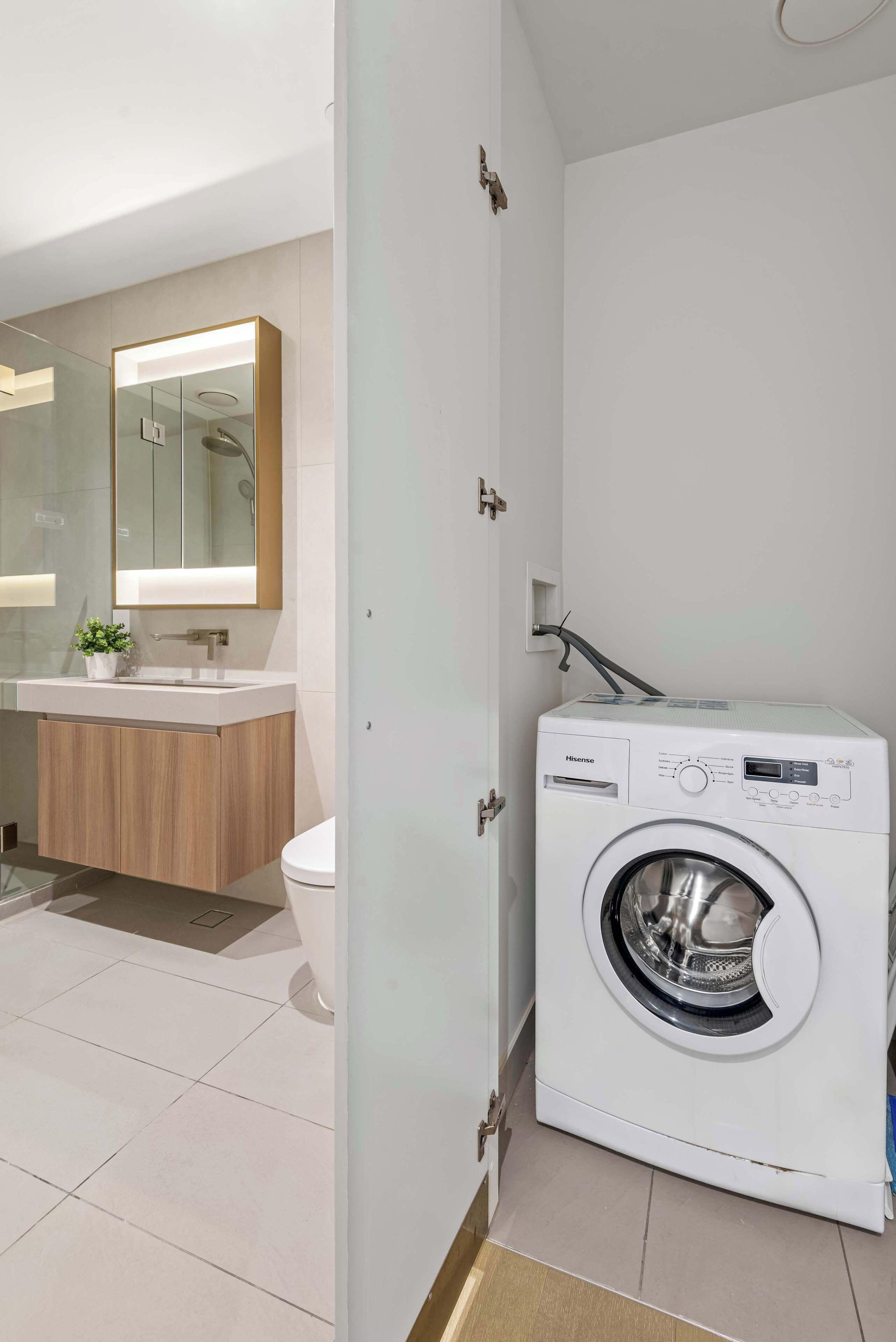 Shower, hair dryer, towels, shampoo
