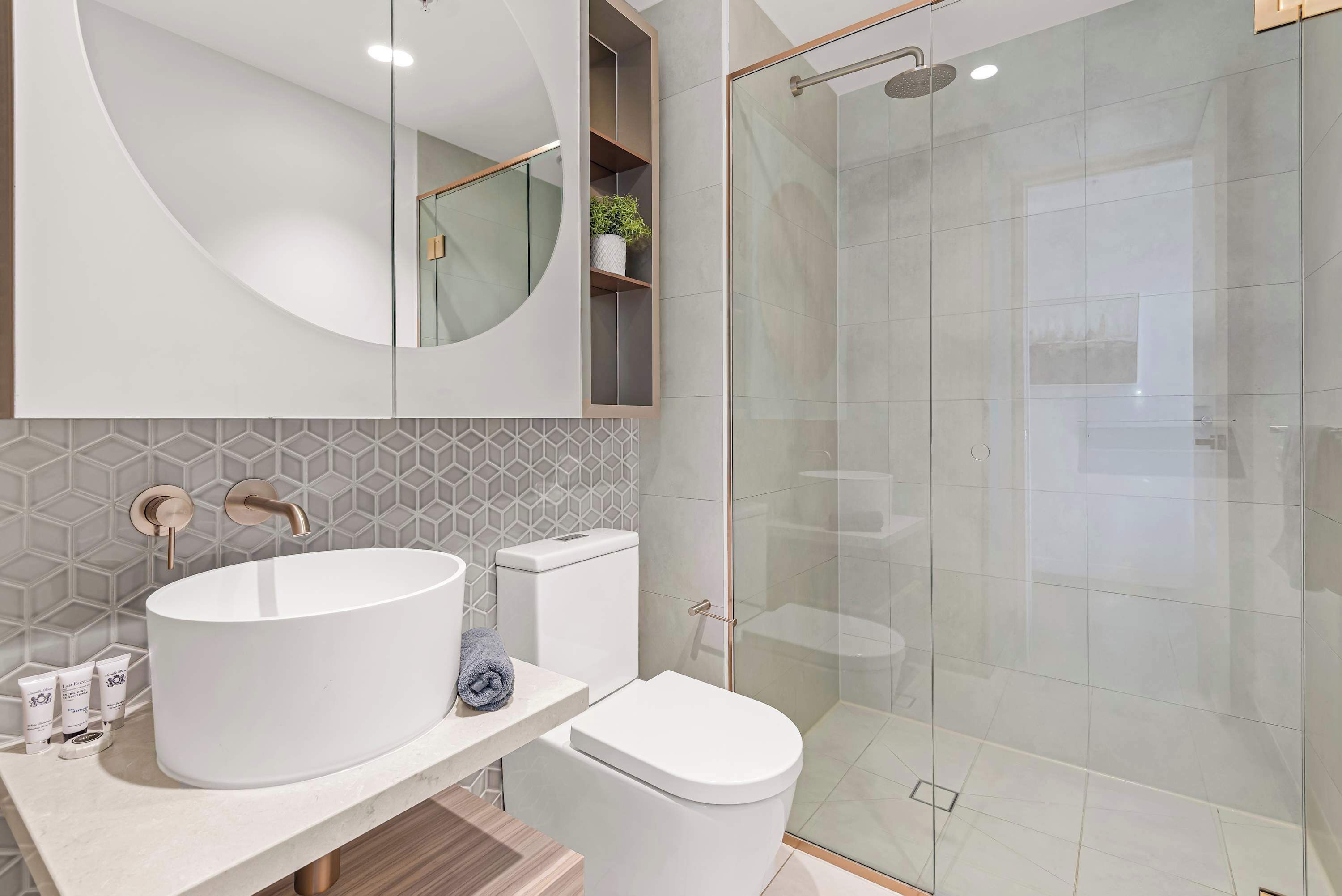 Shower, hair dryer, towels, shampoo