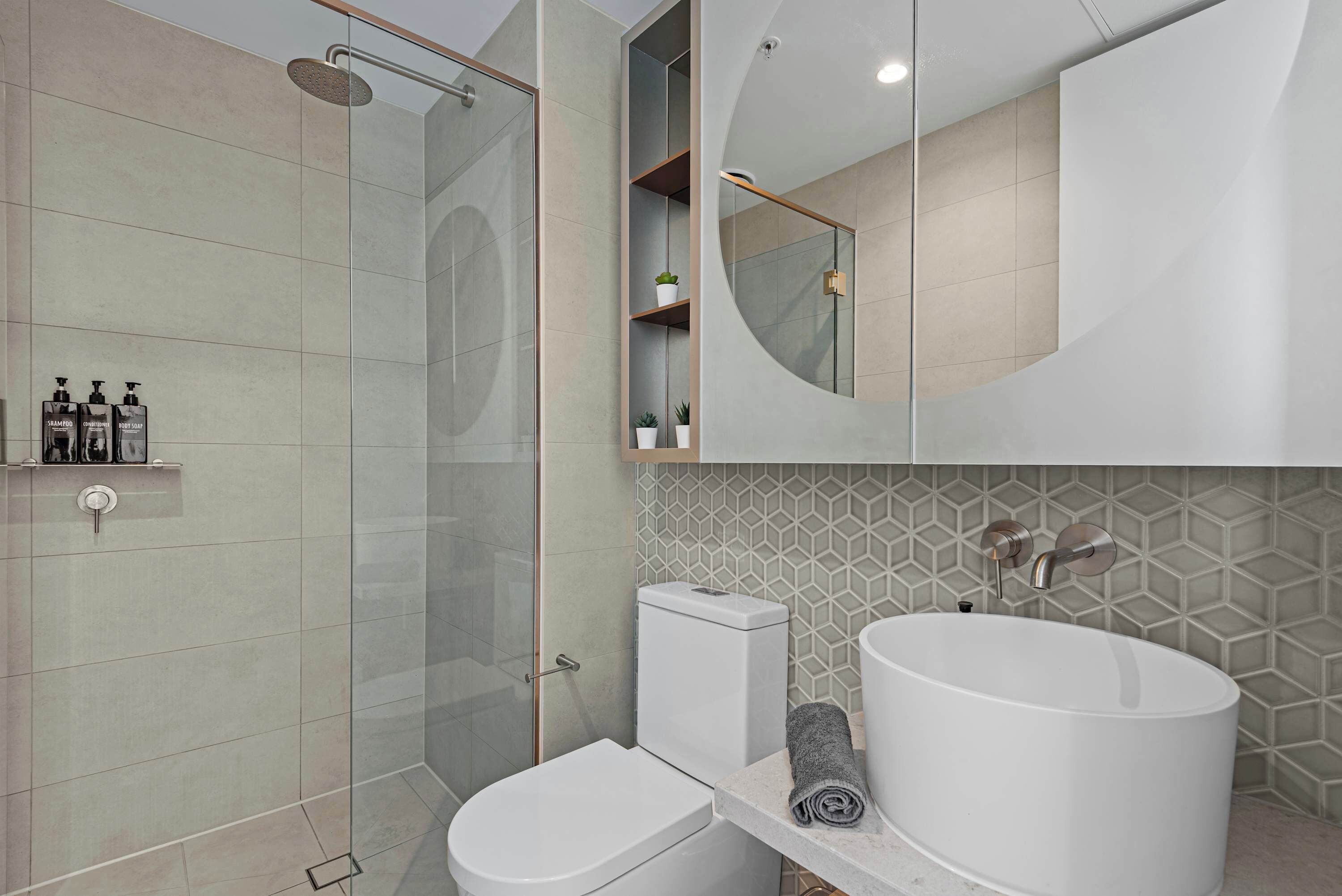 Shower, hair dryer, towels, shampoo
