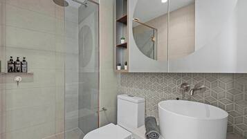 Shower, hair dryer, towels, shampoo