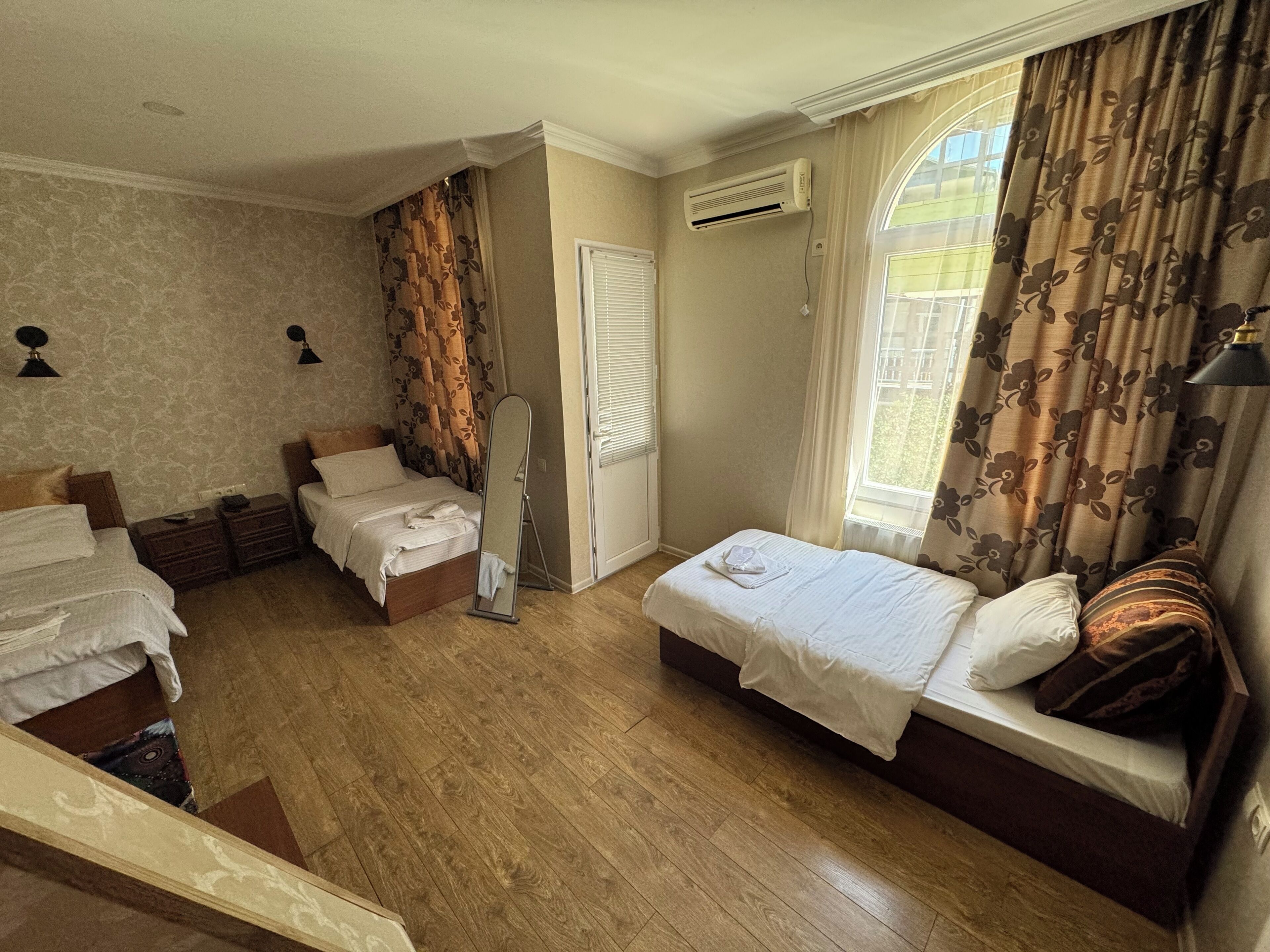 Standard Triple Room, Balcony, City View | Iron/ironing board (on request), free WiFi