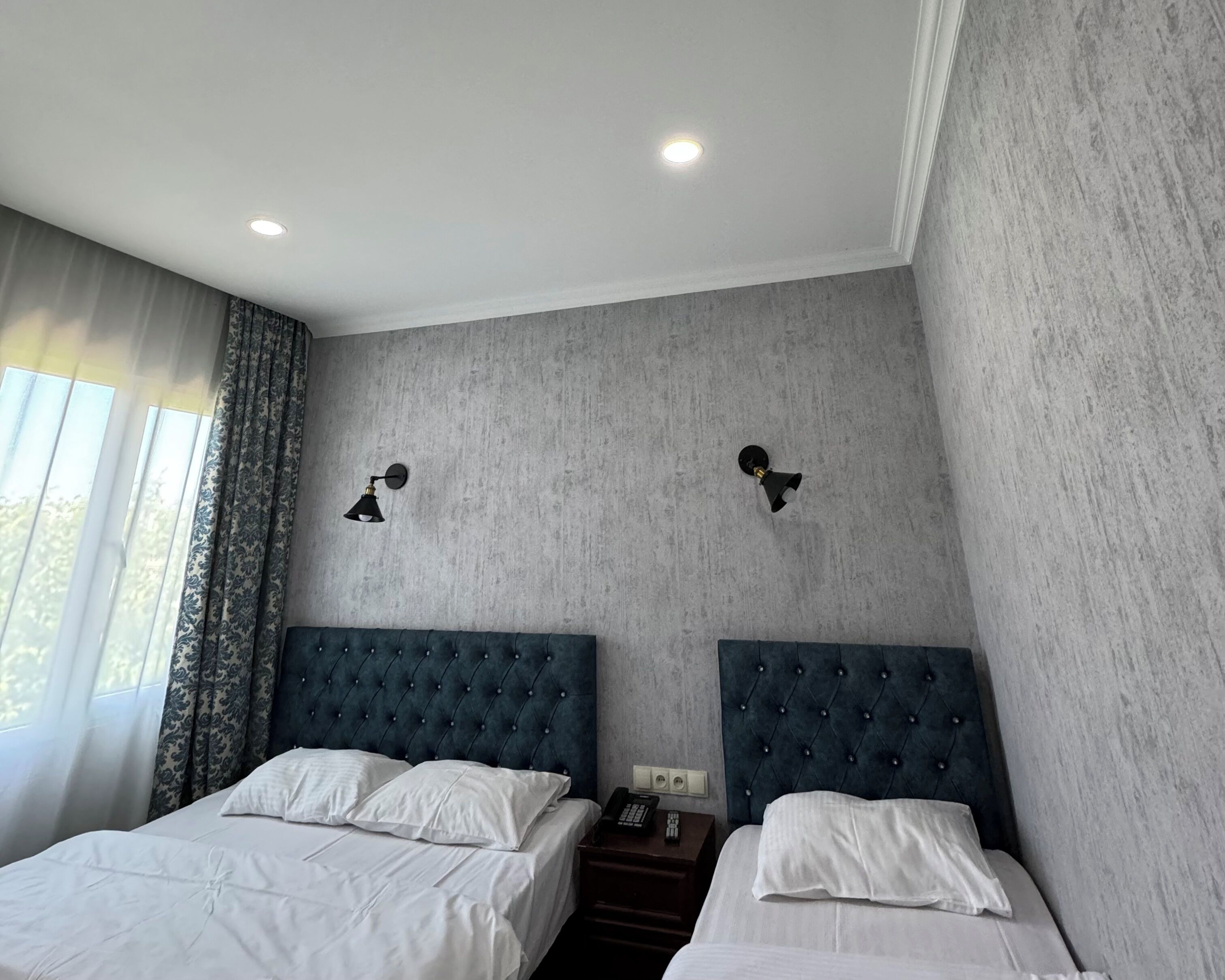 Deluxe Triple Room, City View | Iron/ironing board, free WiFi