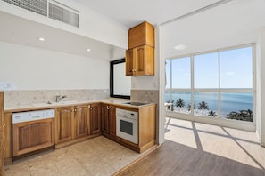 Ático ejecutivo, 4 habitaciones | Cocina privada