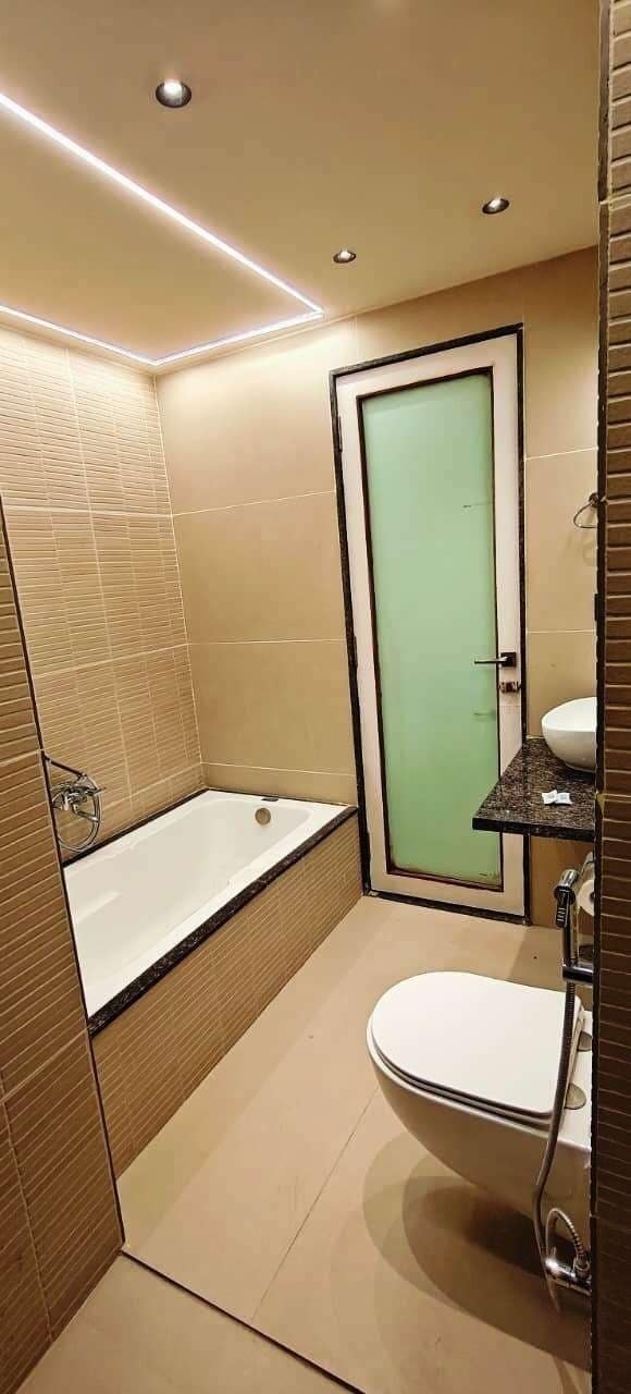 Luxury Suite, City View | Bathroom | Free toiletries, towels, soap, toilet paper