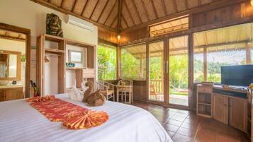 Bungalow, Patio, Garden View | In-room safe, desk, free WiFi
