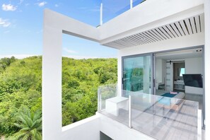 Casa adosada, balcón, vistas al mar | Jardines del alojamiento