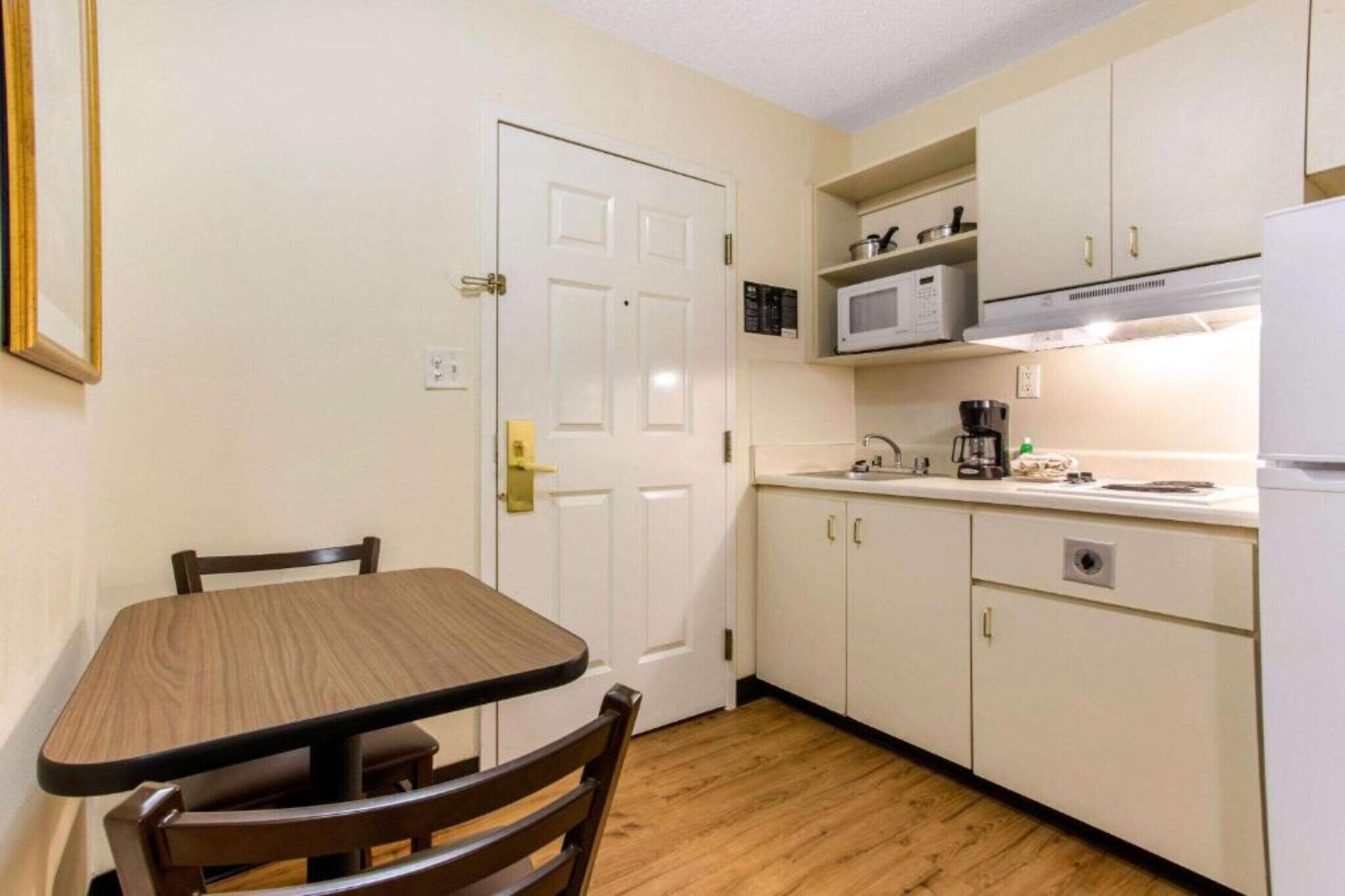 Fridge, microwave, stovetop, coffee/tea maker